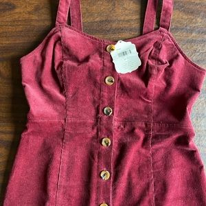 Burgundy corduroy jumper. Size medium. New with tags. Altar’d state.